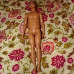 Ken doll with man bun Barbie doll